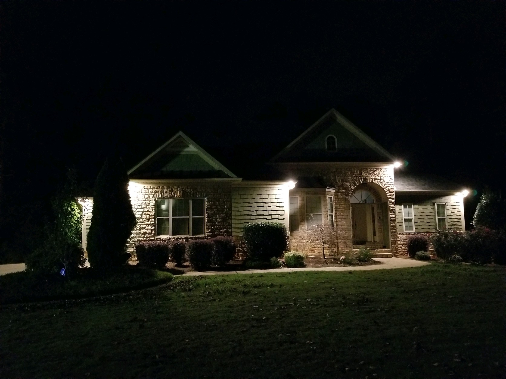Exterior lighting installation on a home